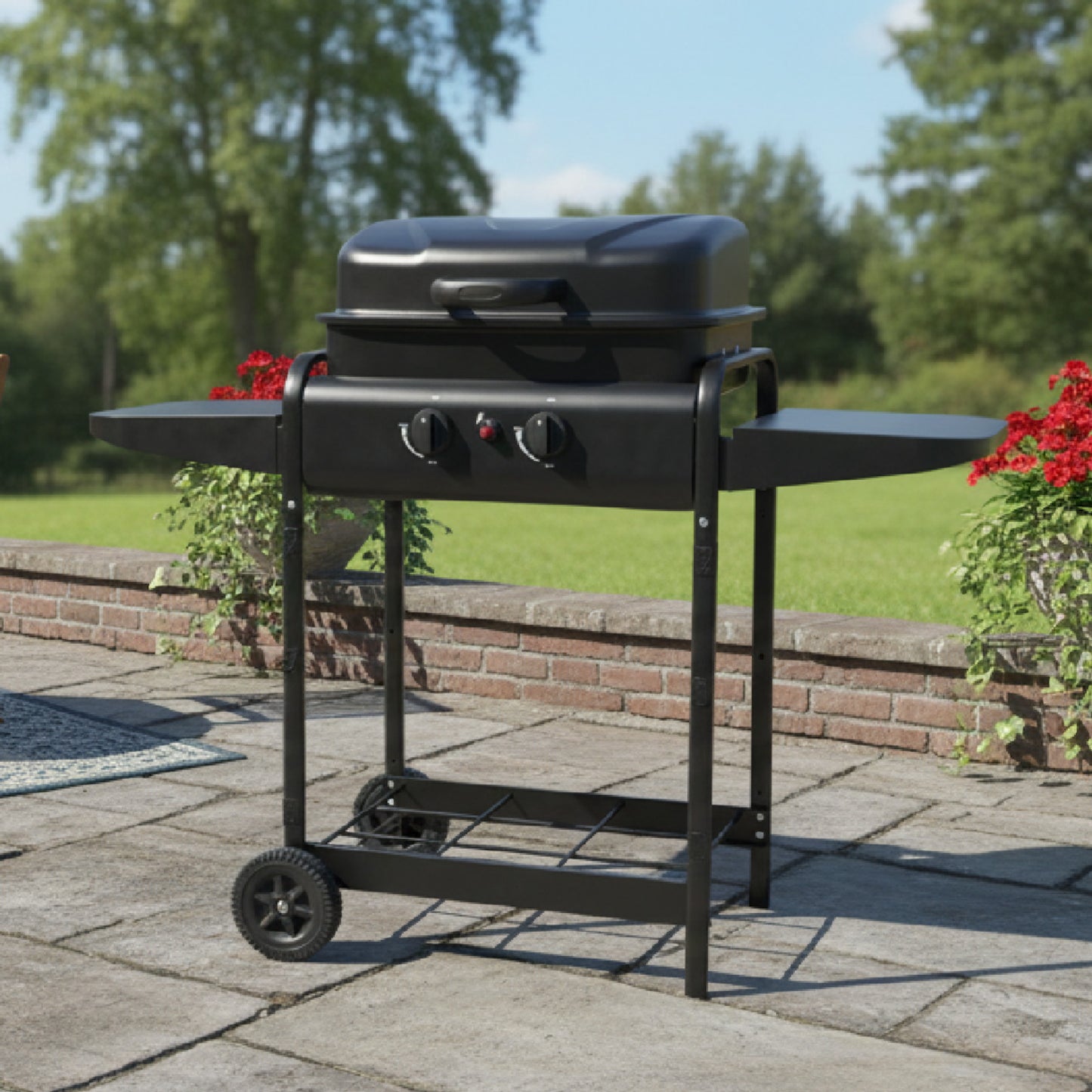 Anafre de gas con dos perillas, negro, vista frontal en patio al aire libre