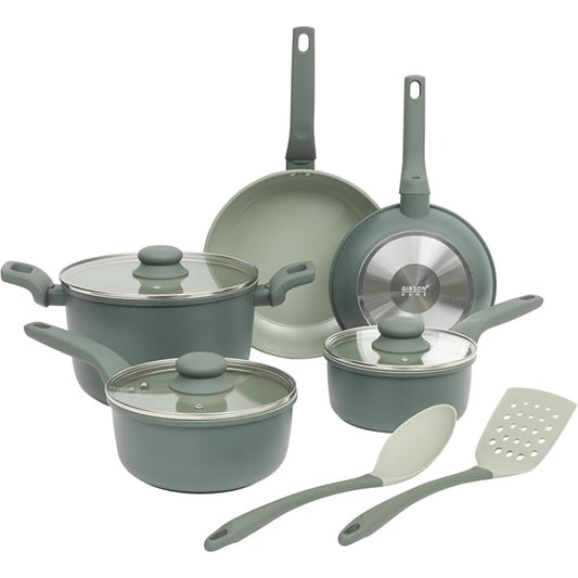 Juego de ollas verde claro con utensilios de cocina, vista frontal