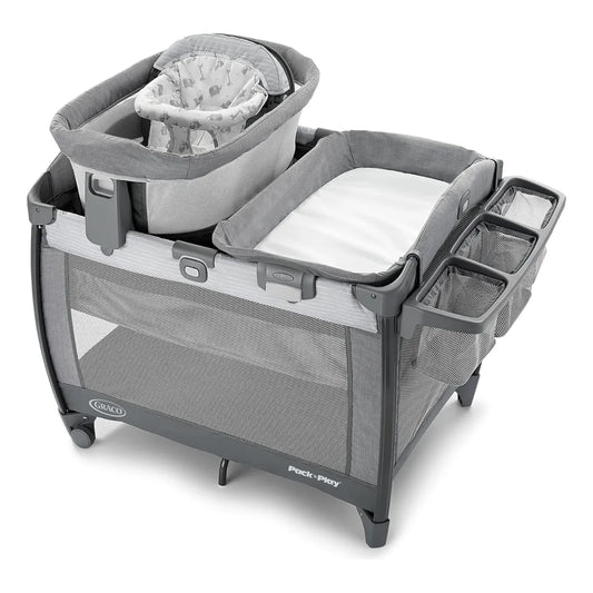 Cuna portátil GRACO gris con mois y cambiador, ideal para el hogar y viajes