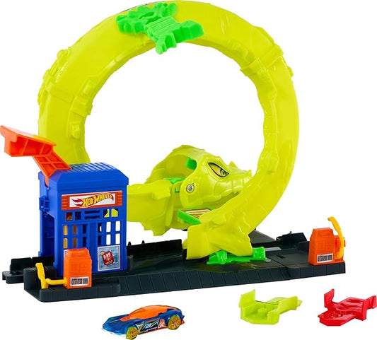 Pista Hot Wheels verde con loop, incluye coche y base para juegos emocionantes.