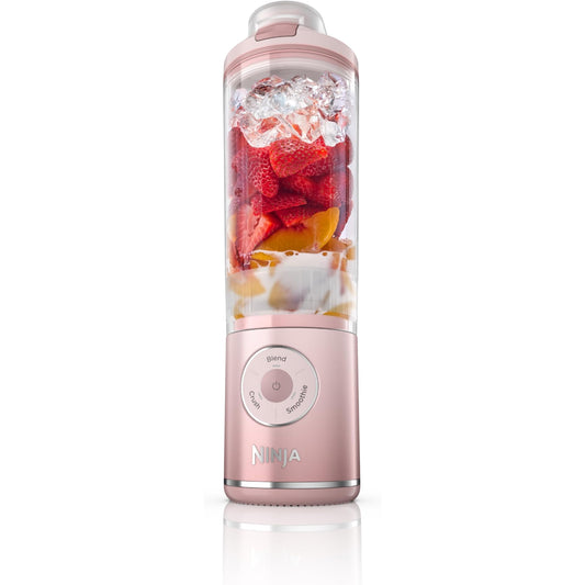 licuadora Ninja rosa con frutas y hielo, vista lateral