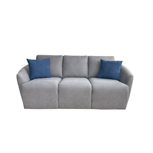 sofá moderno gris con cojines azules, vista frontal