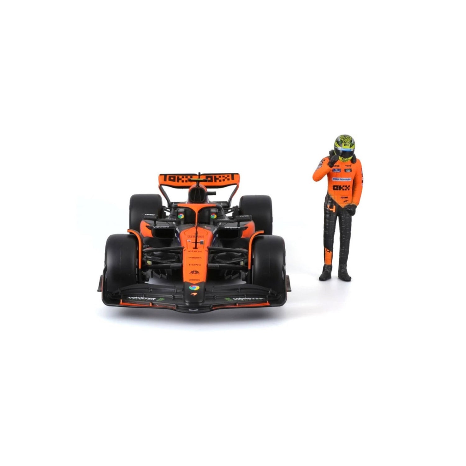 Carro f1 naranja con piloto, vista frontal, detalle realista de Maisto