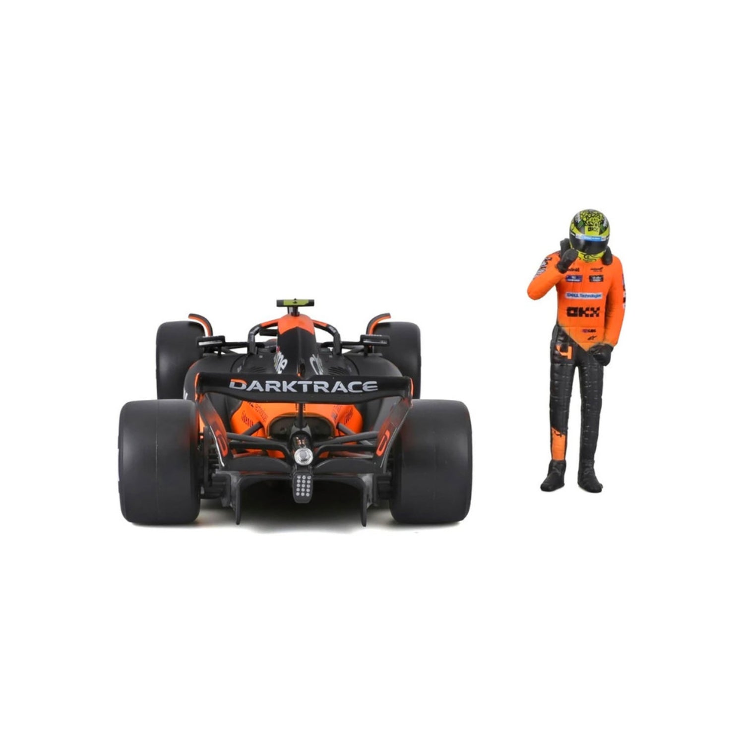 Carro F1 naranja con piloto en acción, modelo detallado de MAISTO
