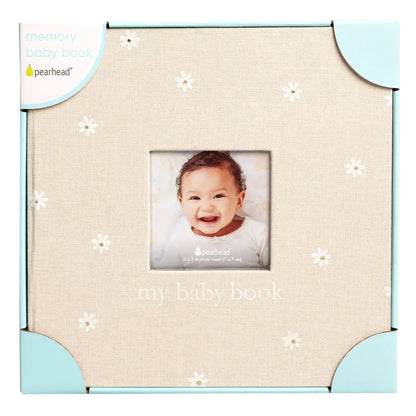 Libro de recuerdos de bebé Pearhead, beige con flores, vista frontal.