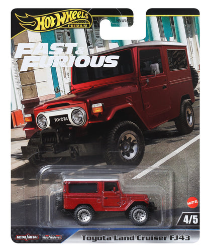 Toyota Land Cruiser FJ43 rojo, modelo Hot Wheels, vista frontal en paquete