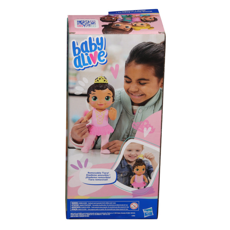 Muñeca Baby Alive en caja, vista frontal, niña jugando felizmente