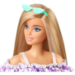 Muñeca Barbie Malibu con gafas turquesa y cabello rubio, vista frontal