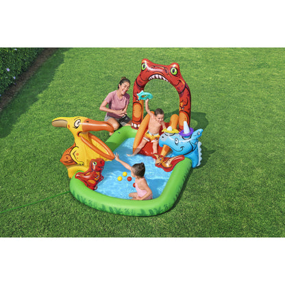 piscina infantil temática dinosaurio colorida, vista lateral, jardín con niños jugando
