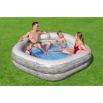 piscina inflable familiar Bestway, gris, vista lateral con familia disfrutando en el jardín