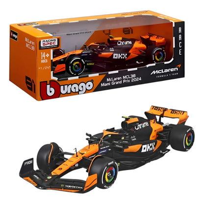 Carro f1 McLaren MCL38 naranja, vista lateral, modelo a escala 1:24.