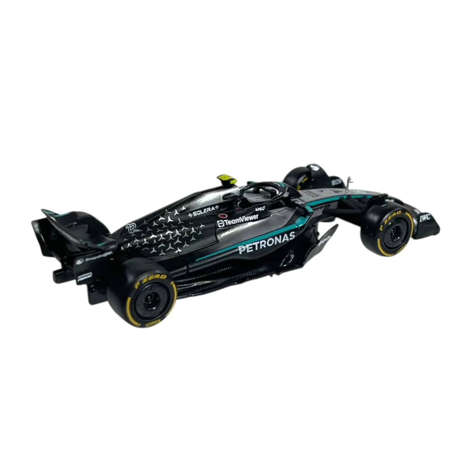 Carro de Fórmula 1 negro con detalles de patrocinio y ruedas amarillas, vista lateral