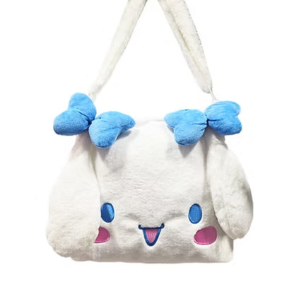 Cartera blanca con orejas de conejo y moños azules, ideal para fans de SANRIO
