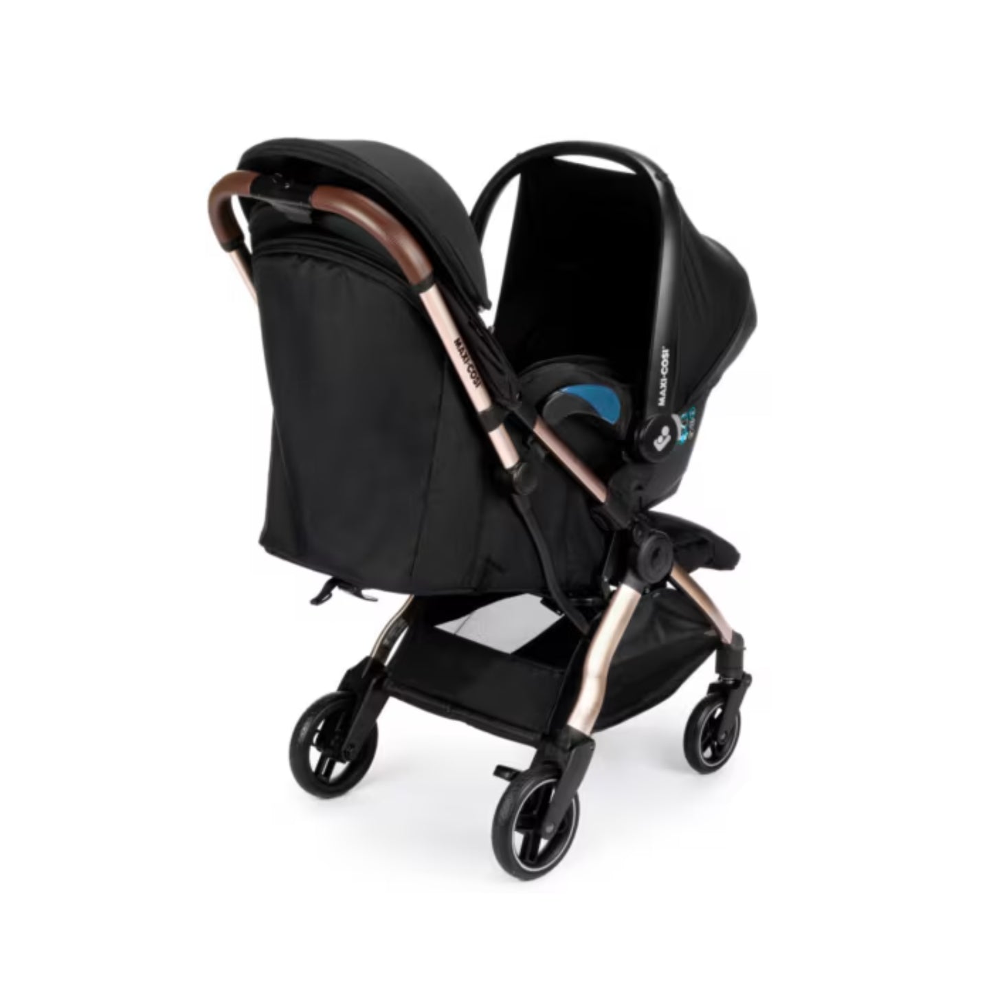 Coche para bebé negro de MAXI COSI, vista lateral con capota y manillar