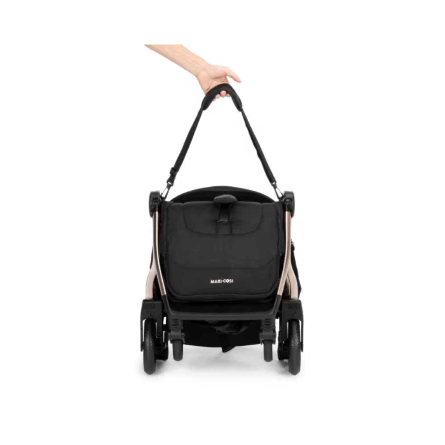 Coche Maxi Cosi negro, vista trasera con asas de transporte en uso