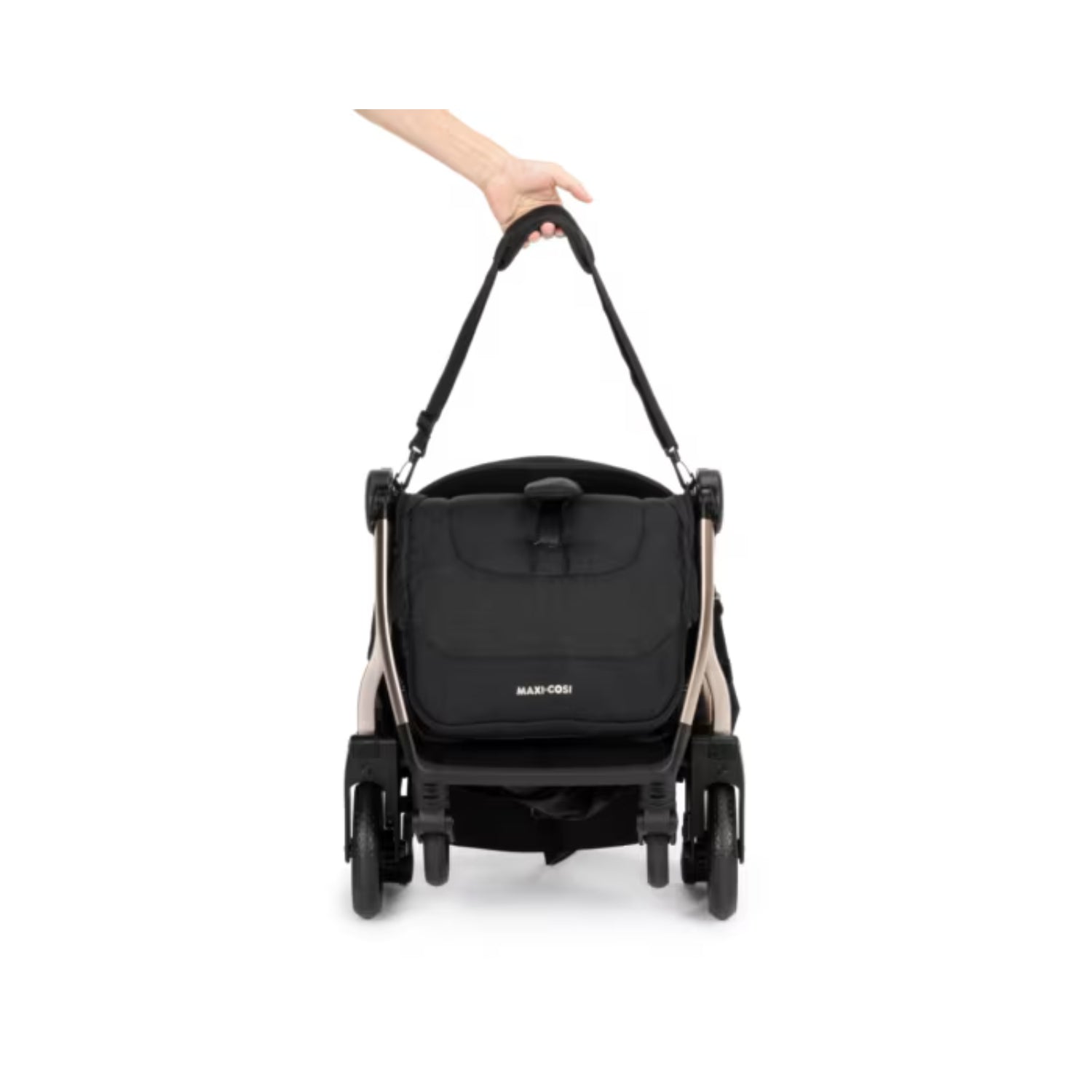 Coche Maxi Cosi negro, vista trasera con asas de transporte en uso