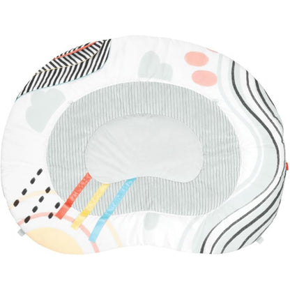 Almohada de lactancia SKIP*HOP con diseño colorido y suave para apoyo en la alimentación