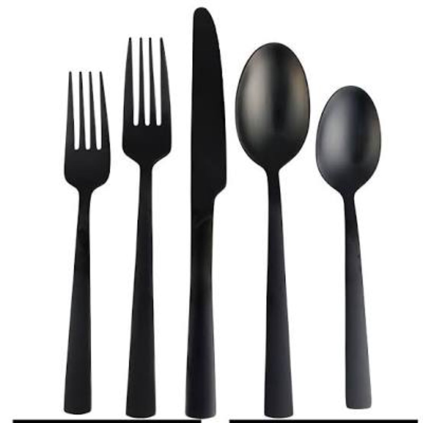 Cubiertos GIBSON HOME en negro, vista frontal, mesa elegante.