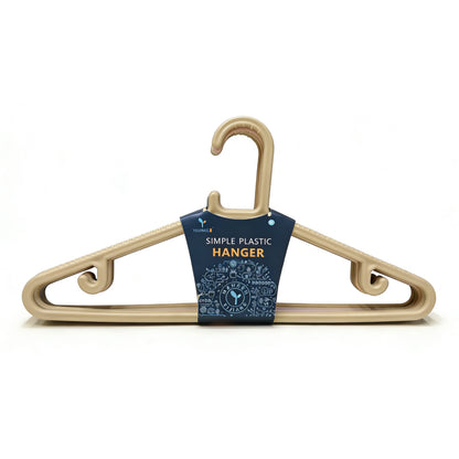 Ganchos plásticos color beige, vista frontal, ideal para organizar ropa