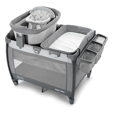 Cuna portátil GRACO gris con mois y cambiador, ideal para el hogar y viajes