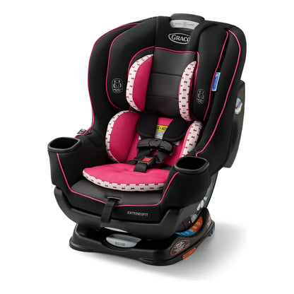 silla de auto Graco negra y rosa, vista frontal, comodidad y seguridad para niños