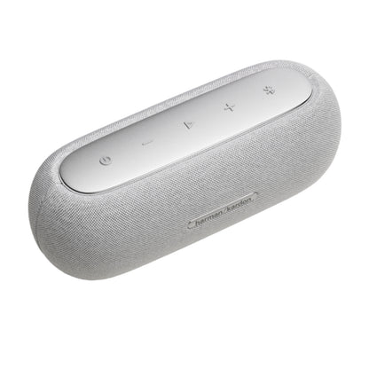 Parlante HARMAN KARDON blanco lateral, diseño elegante y compacto