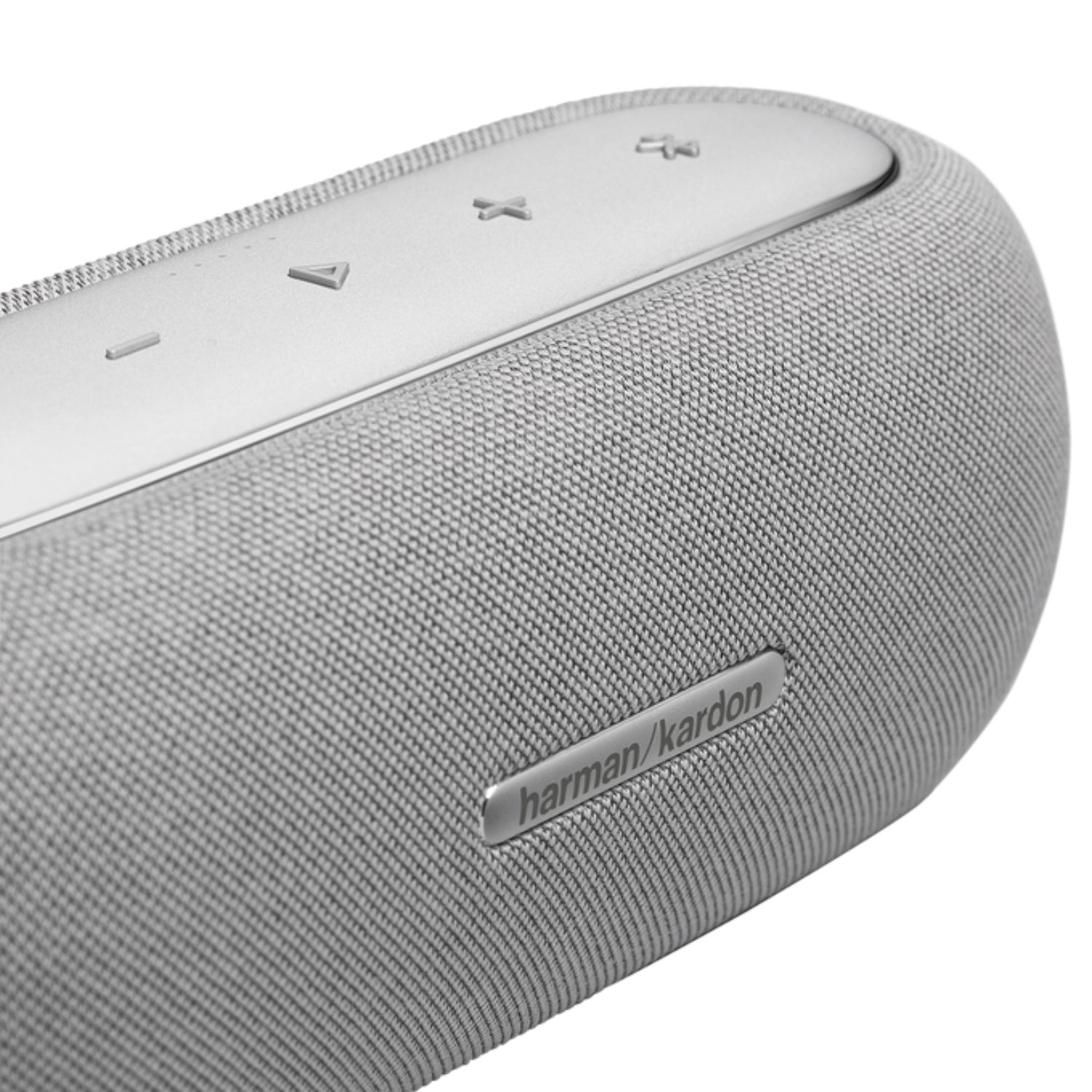 Parlante gris Harman Kardon vista lateral con controles de reproducción