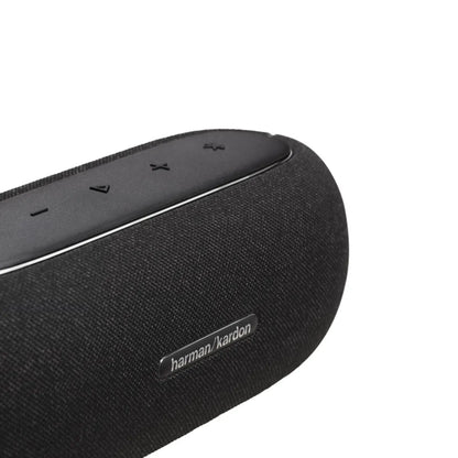Parlante Harman Kardon negro con controles en la parte superior