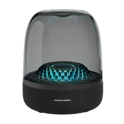 Parlante Harman Kardon negro con diseño moderno y luces LED en la parte superior