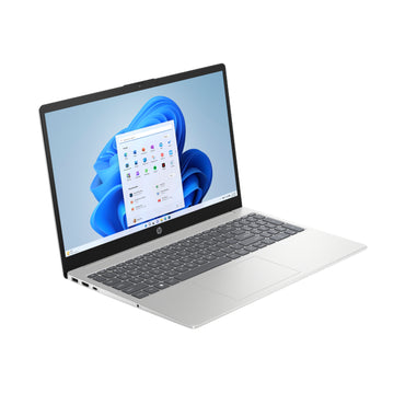 Laptop HP plateada, vista lateral con pantalla Windows 11