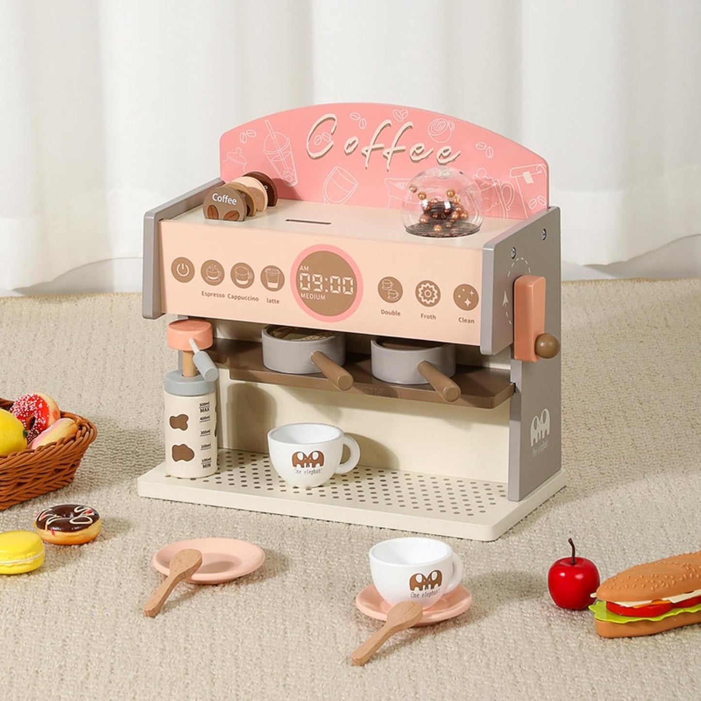 Máquina de café de juguete rosa y beige, vista frontal, ideal para niños
