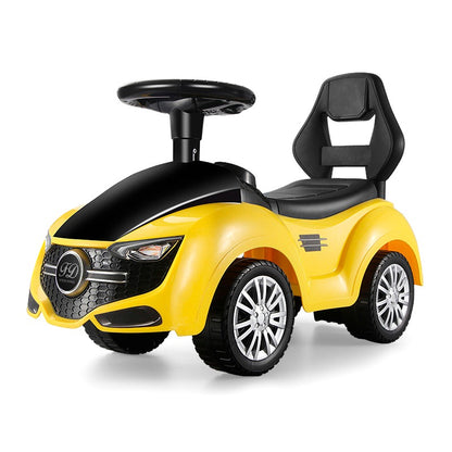 Cochecito amarillo para niños, vista lateral, ideal para juegos al aire libre
