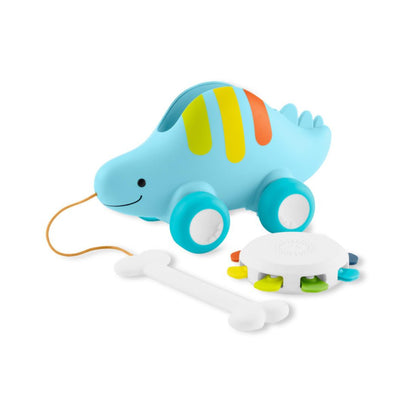 Juguete dinosaurio azul con ruedas, vista frontal, para niños