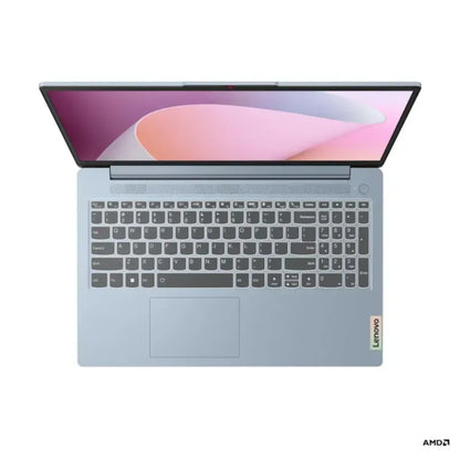 Laptop Lenovo azul claro vista superior, teclas y touchpad visibles