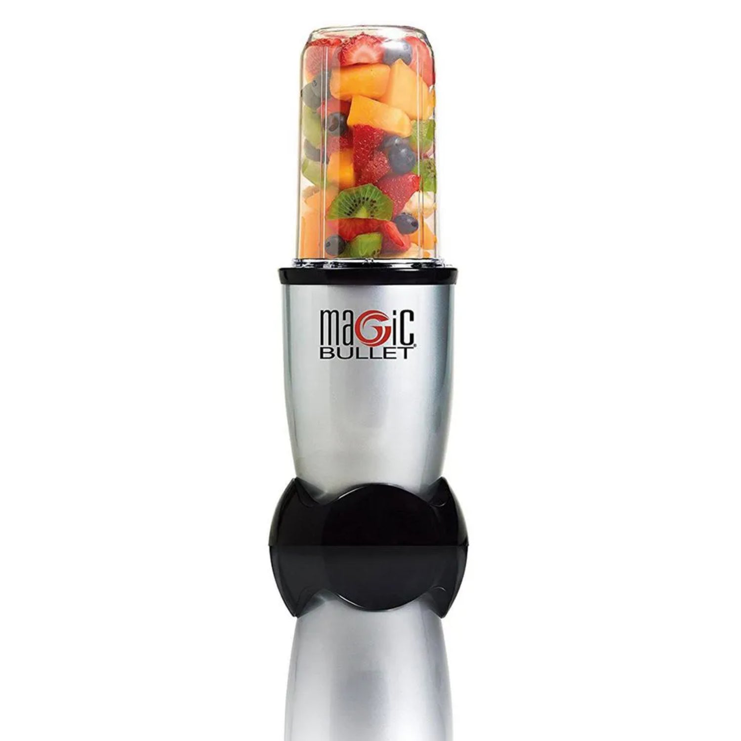 Licuadora Magic Bullet 11 piezas con vaso transparente lleno de frutas frescas y coloridas.