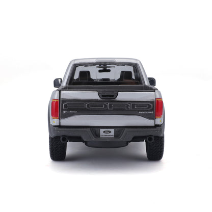 Carro Ford Raptor gris visto desde atrás