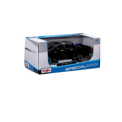 Maisto Hilux negra en caja especial, modelo a escala 1:27