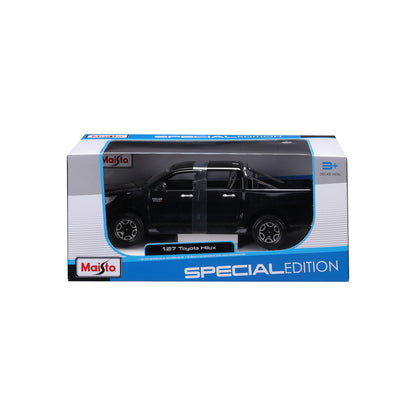 Maisto Hilux edición especial vista frontal en caja
