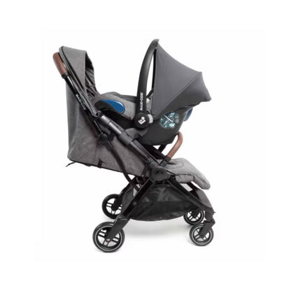 Silla de coche Maxi Cosi gris lateral, ideal para transporte seguro de bebés