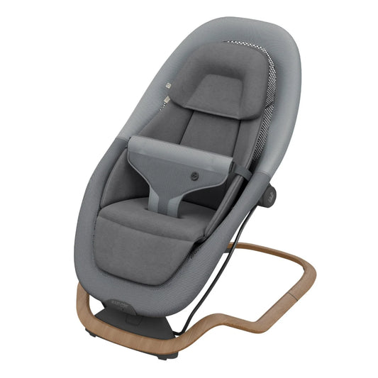 Mecedora gris MAXI COSI, vista lateral en ambiente moderno