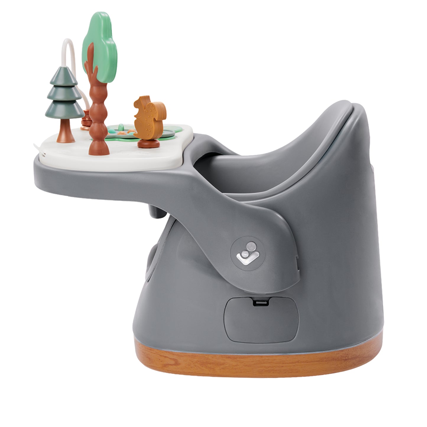 Silla gris MAXI COSI con bandeja de juegos, vista lateral en un ambiente infantil