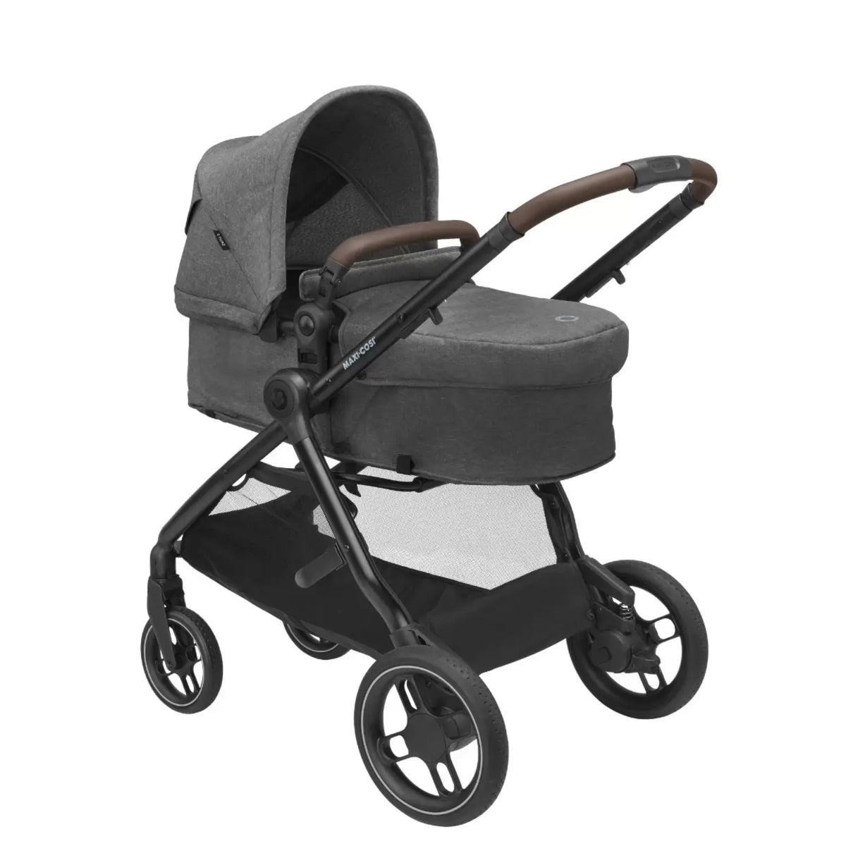 Coche MAXI COSI gris, vista lateral con capota y manija marrón