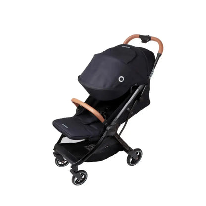Coche MAXI COSI negro lateral, perfecto para paseos urbanos