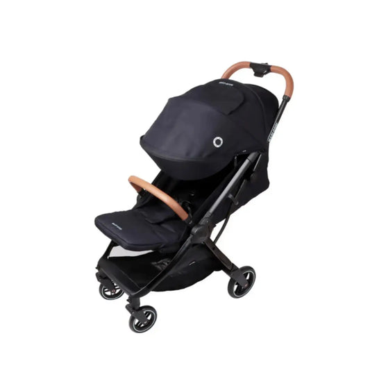Coche MAXI COSI negro lateral, perfecto para paseos urbanos