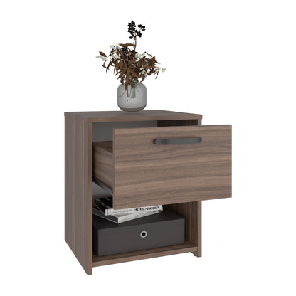 mesa marrón, vista lateral, cajón abierto con libros y planta decorativa