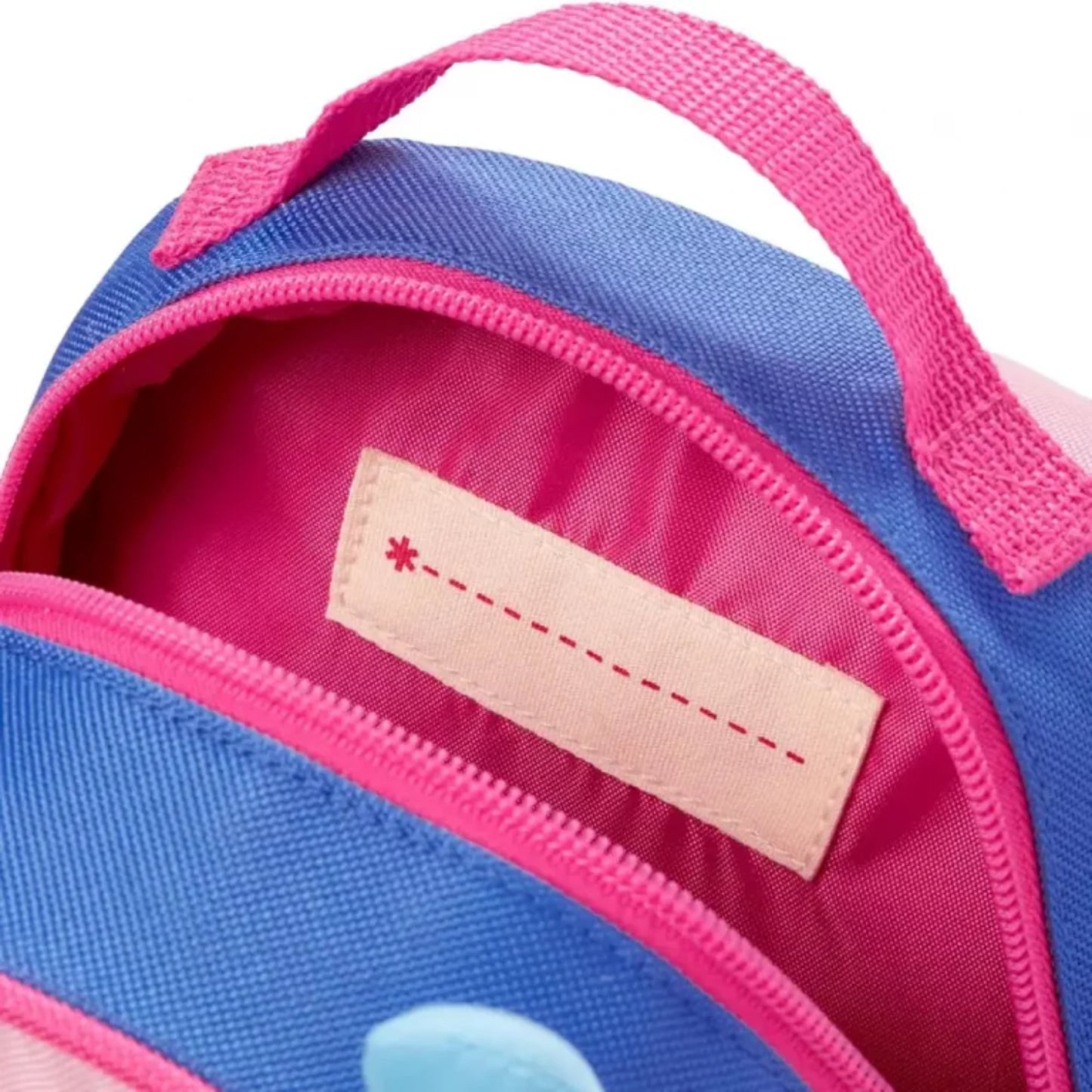 mochila infantil azul y rosa, vista interior con compartimento