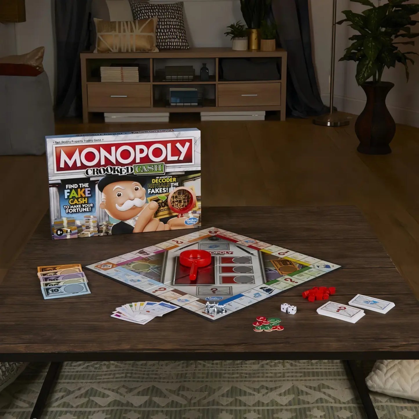 Juego de mesa Monopoly casino, caja y tablero en sala, vista frontal