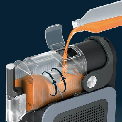 Máquina de bebidas congeladas Ninja vertiendo jugo en el recipiente con diseño innovador y funcional