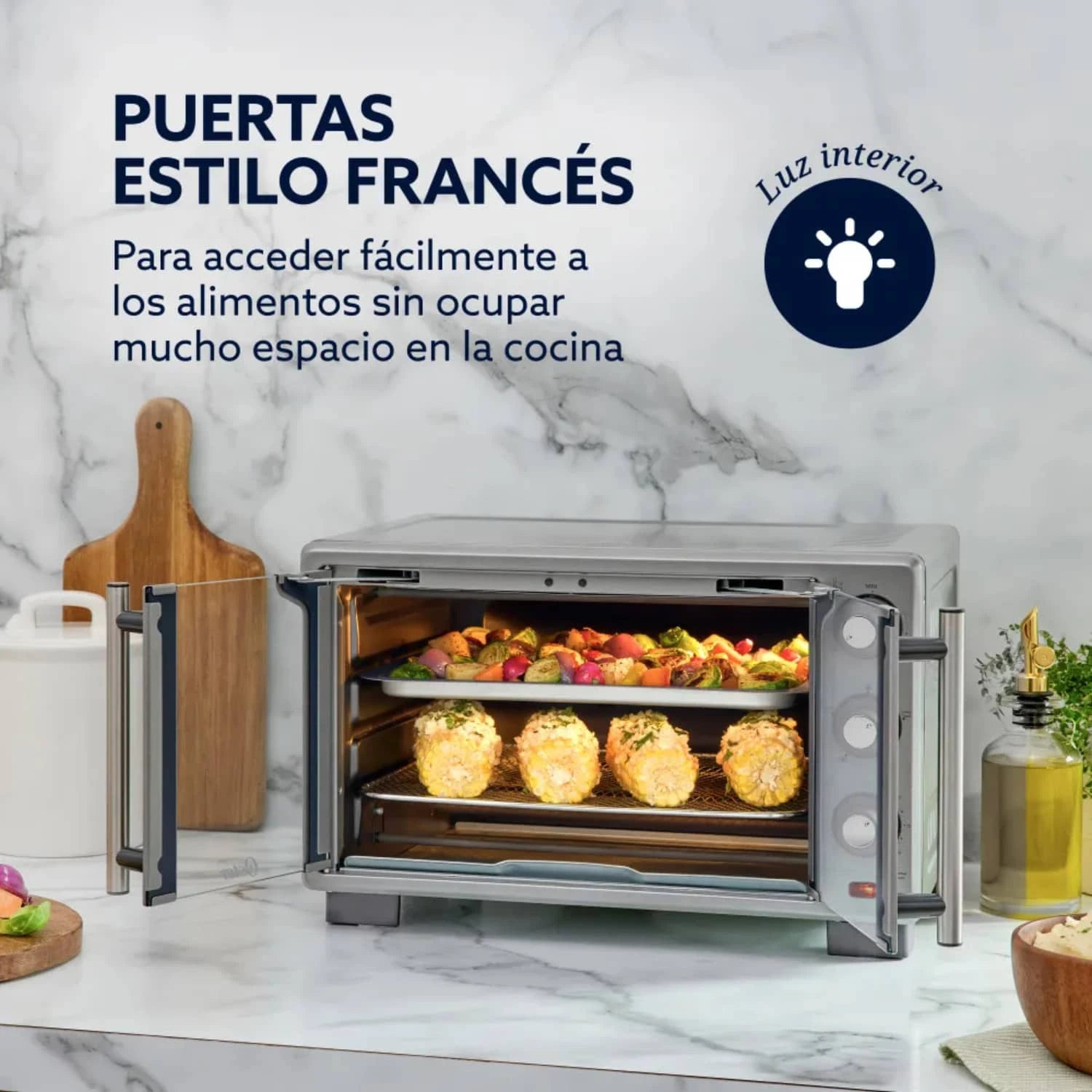 Horno freidora de aire Oster con puertas estilo francés y luz interior para facilitar el acceso a los alimentos.