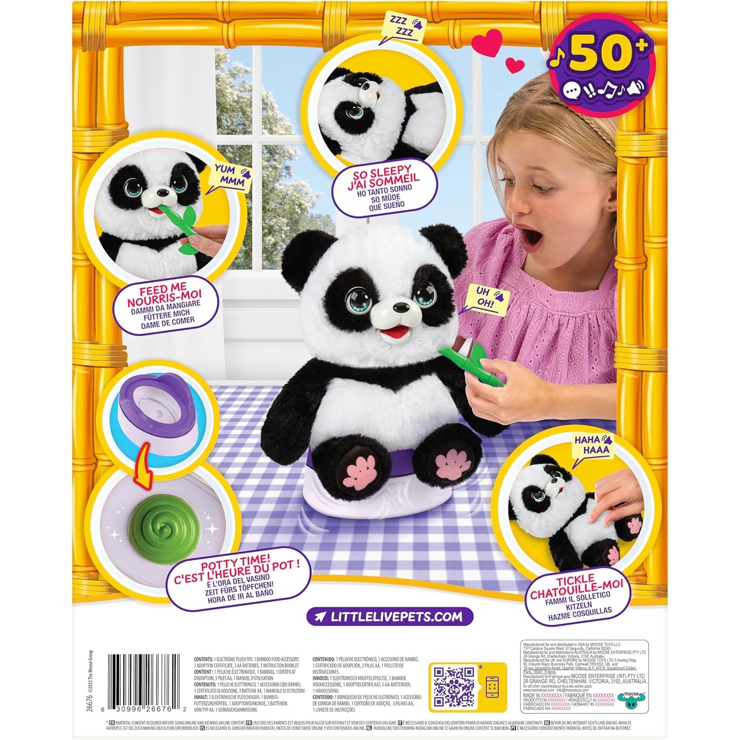 Peluche osos panda negro y blanco, niño jugando con él en una mesa